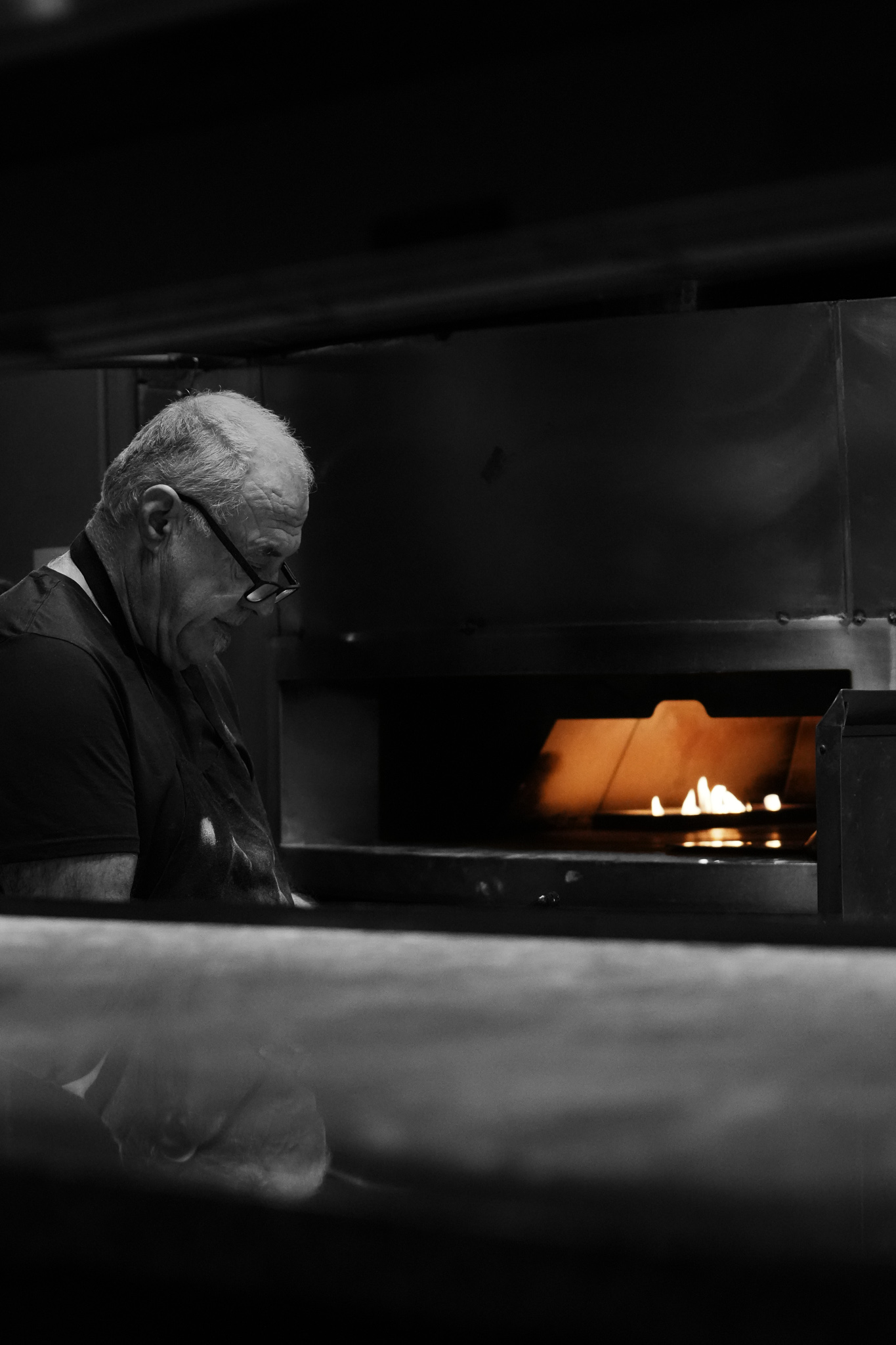 Photo of Tony V in the kitchen taken by Kira Gendjar.