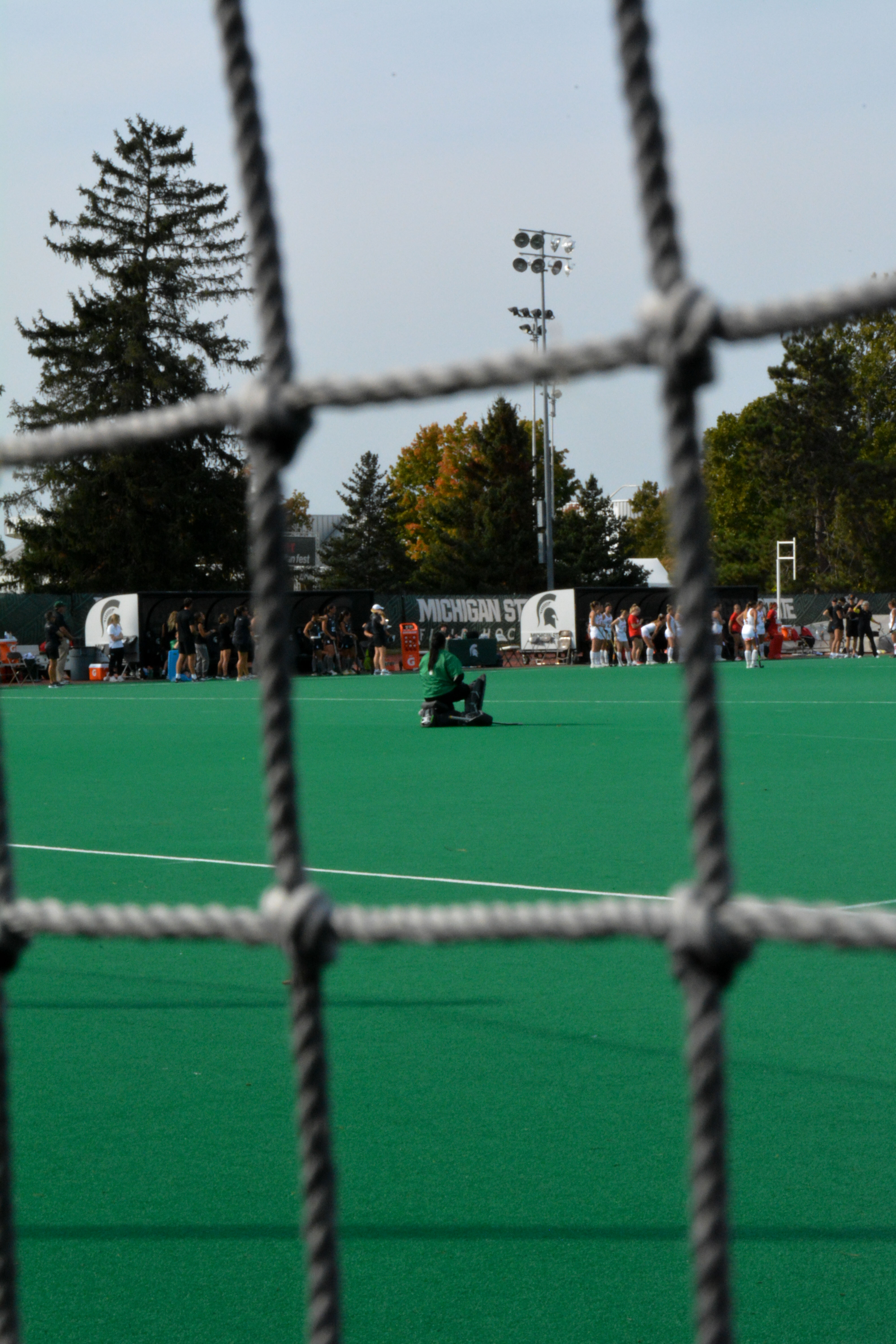 Photo of Michigan State University’s Field Hockey team taken by Kira Gendjar.