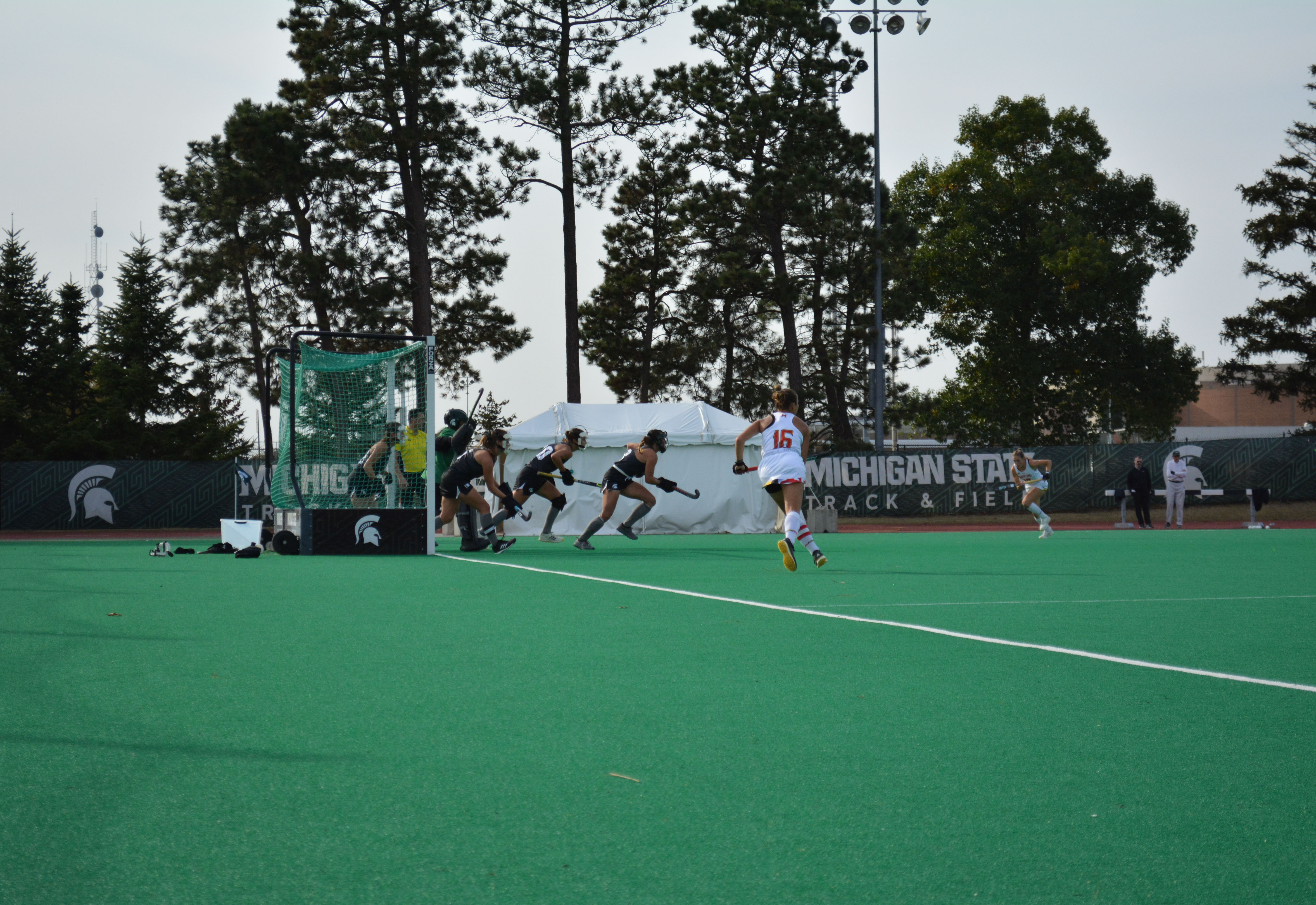 Photo of Michigan State University’s Field Hockey team taken by Kira Gendjar.